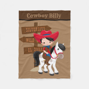 Niedlicher Baby-Junge gibt Cowboytuch Fleecedecke
