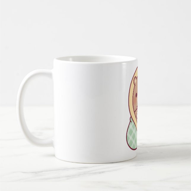 Niedlicher Bär, der während des Spielens in heimel Kaffeetasse (Links)