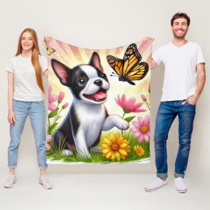 Niedlicher Boston Terrier Welpe spielen mit Schmet Fleecedecke