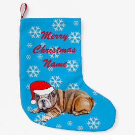 Niedlicher Bulldog mit Weihnachtsmannmütze Kleiner Weihnachtsstrumpf