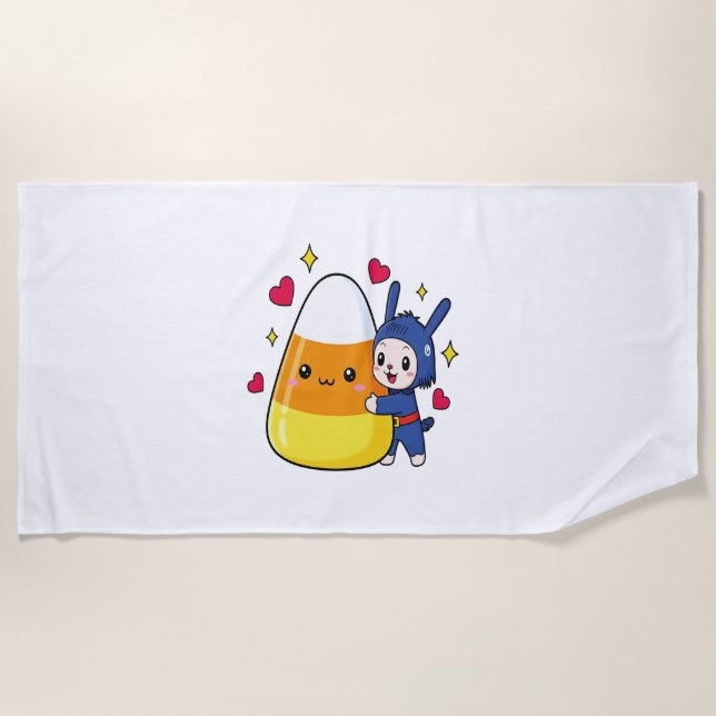 Niedlicher Bunny Hugging Candy Corn Strandtuch (Vorderseite)