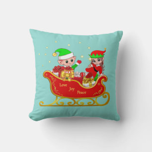 Niedlicher Elf auf Weihnachtsschlitten auf Türkis Kissen
