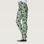 Niedlicher Fun Black on Sage Green Paw Prints Leggings<br><div class="desc">Diese lustigen Leggings sind perfekt für Hunde- und Katzenliebhaber. Sie zeichnen sich durch ein niedliches Muster aus,  dessen schwarze Pfoten auf einem hellgrünen Hintergrund verstreut sind. Fun whimsical Design ist perfekt für Haustier-Eltern und Tierfreunde.</div>