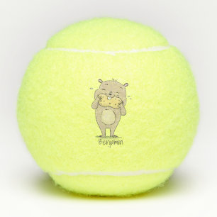 Niedlicher, glücklicher Hamster mit Erdnuss-Cartoo Tennisbälle