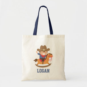Niedlicher glücklicher kleiner Cowboy auf Tragetasche