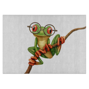 Niedlicher grüner Baum-Frosch mit Augen-Gläsern Schneidebrett