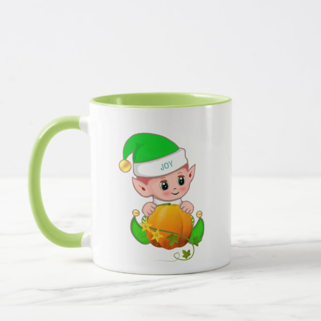 Niedlicher grüner Elf mit Pumpkin Tasse (Links)