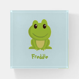 Niedlicher grüner Frosch auf blau Briefbeschwerer