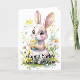 Niedlicher Hase mit Ostereier und Blumenbeet Feiertagskarte