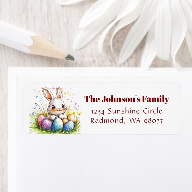 Niedlicher Hasen mit farbigen Eieradressen (Insitu)