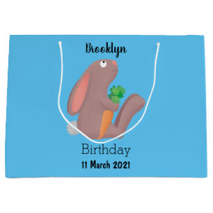 Niedlicher Hasenkaninchen sitzt mit Karikatur-Möhr Große Geschenktüte