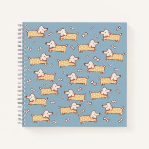 Niedlicher Hund und Knochen Nahtloses Muster Notizbuch