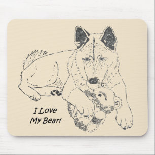 Niedlicher Japaner Akita mit dem Teddybären, der Mousepad
