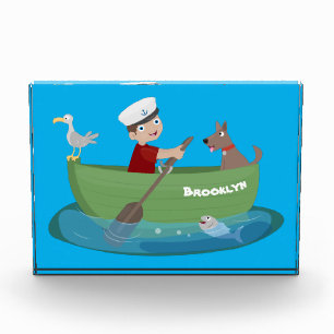 Niedlicher Junge Segelschiff und Hunderuderschiff Fotoblock