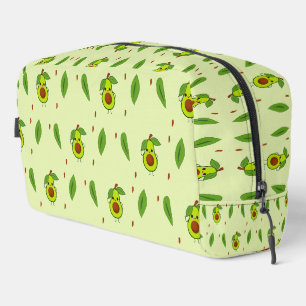 Niedlicher Kawaii-Avocado auf grüner Fläche Waschbeutel