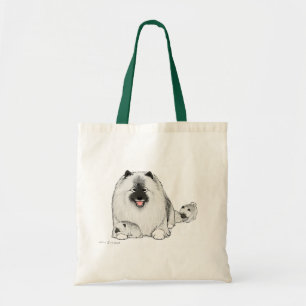 Niedlicher Keeshond Hund mit Welpen Tragetasche