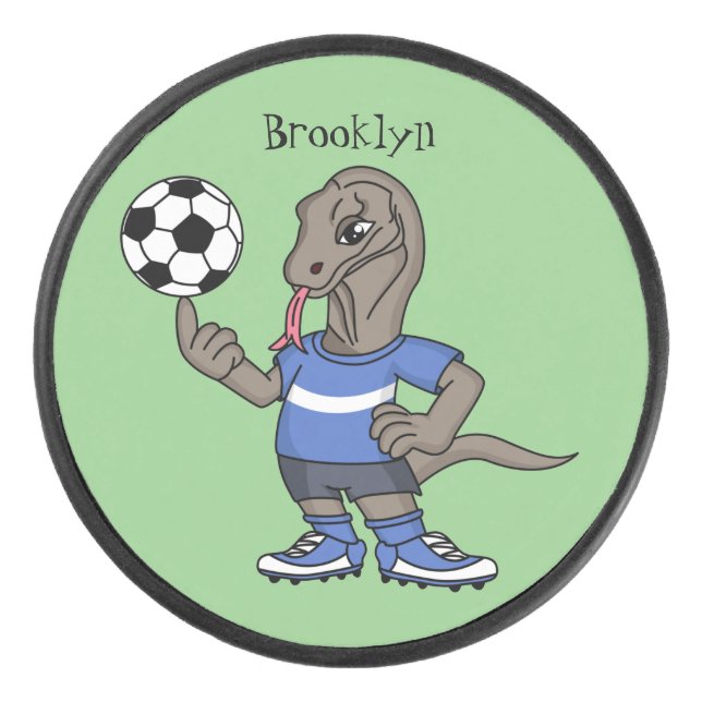 Niedlicher Komodo-Drache beim Fußballspielen Carto Eishockey Puck (Vorderseite)