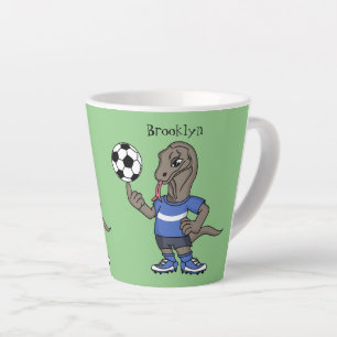Niedlicher Komodo-Drache beim Fußballspielen Carto Milchtasse