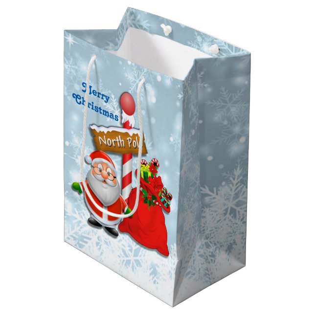 Niedlicher Nordpol Santa Mittlere Geschenktüte (Vorderseite Schrägansicht)