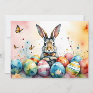 Niedlicher Osterhase mit farbenfrohen bemalten Eie