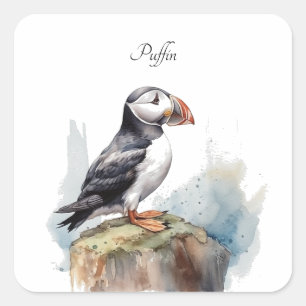 Niedlicher Puffin auf einem Felsen in Aquarell Quadratischer Aufkleber
