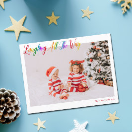 Niedlicher Regenbogen, der das Weihnachtsfest durc Feiertagspostkarte