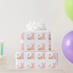 Niedlicher rosa Osterhase mit Frühlingsblumen  Geschenkpapier