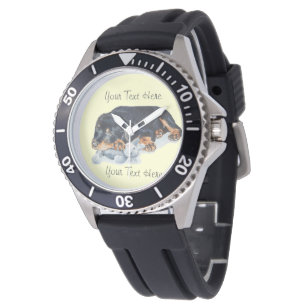 niedlicher Rottweiler-Welpenhund, der Teddy-Bärenk Armbanduhr