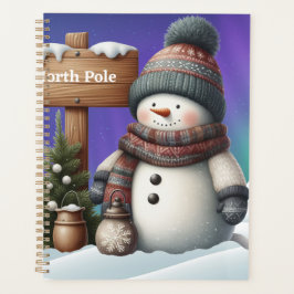 Niedlicher Schneemann am Nordpol mit Nordlichter Planer