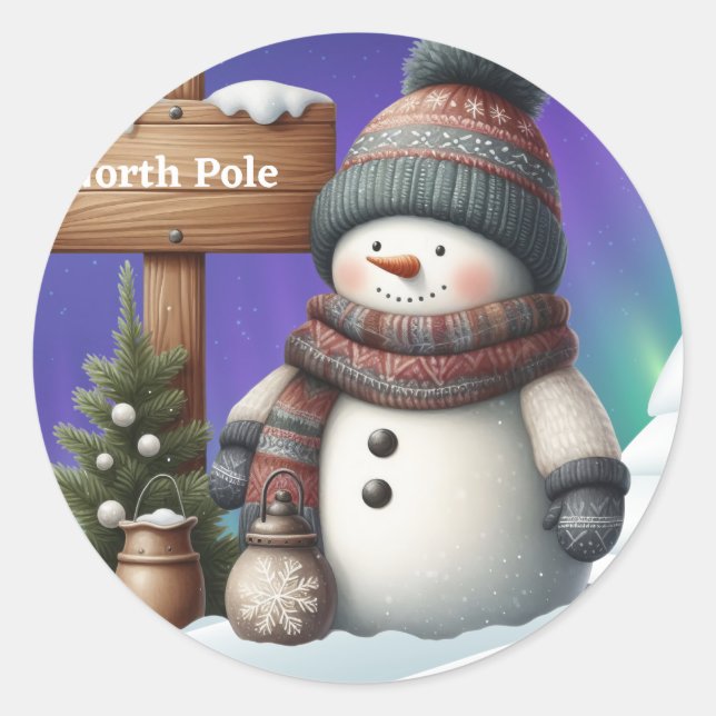 Niedlicher Schneemann am Nordpol mit Nordlichter Runder Aufkleber (Vorderseite)