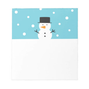 Niedlicher Schneemann auf Schneehang Notizblock