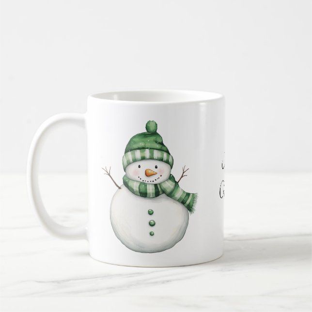 Niedlicher Schneemann im Grünen Scarf und Strick B Kaffeetasse (Links)