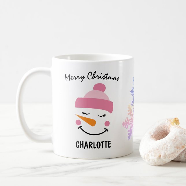 Niedlicher Schneemann in einem Skihut. Frohe Weihn Kaffeetasse (Mit Donut)