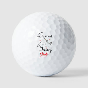 Niedlicher Schwan, der ein frisches Baby trägt Golfball