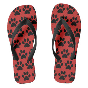 Niedlicher schwarzer Hundepaw druckt rotes Schwarz Flip Flops
