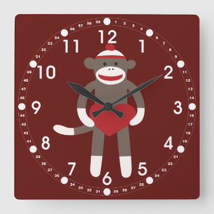 Niedlicher Socketaffe mit Hut und Herz Quadratische Wanduhr