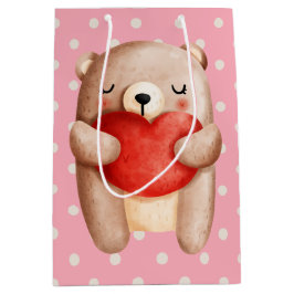 Niedlicher Teddybär mit einem roten Herz Mittlere Geschenktüte