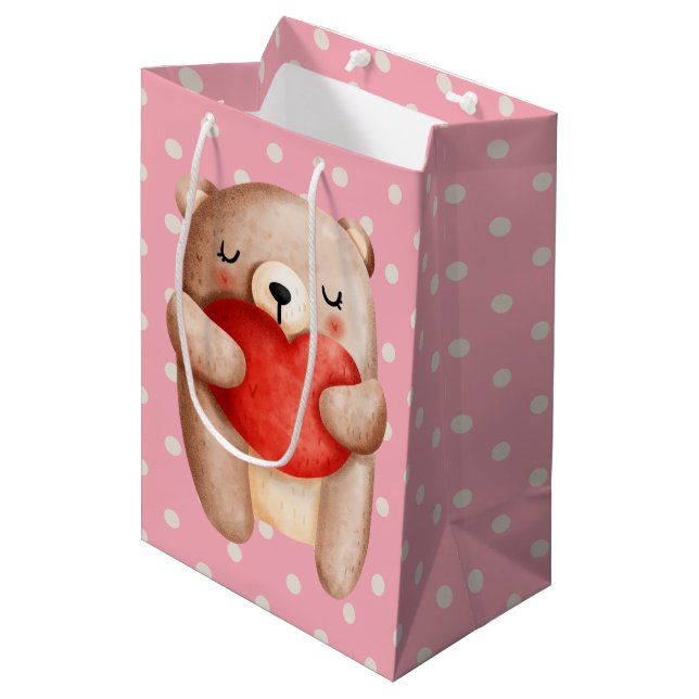 Niedlicher Teddybär mit einem roten Herz Mittlere Geschenktüte (Vorderseite Schrägansicht)