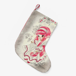 Niedlicher Weihnachtsengel mit dem rotem Haar und Kleiner Weihnachtsstrumpf