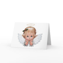Niedlicher Weihnachtsjunge Angel in den Händen