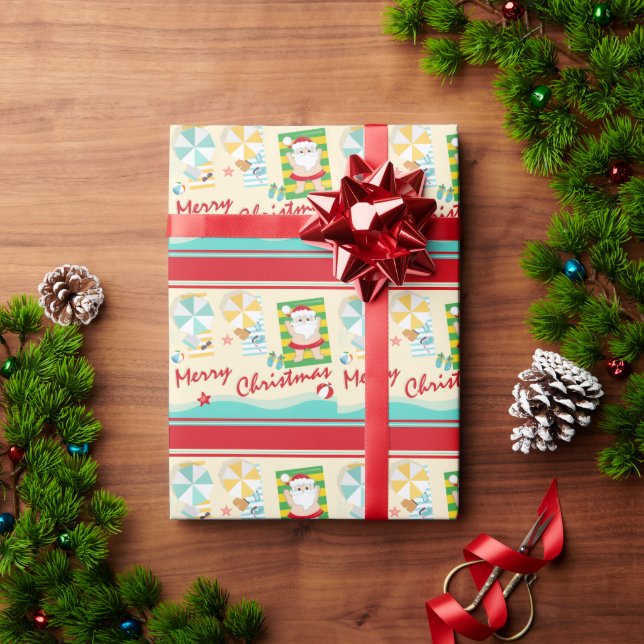 Niedlicher Weihnachtsmann am Strand Frohe Weihnach Geschenkpapier (Feiertagsgeschenk)