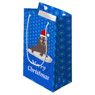 Niedlicher Weihnachtswalrus und Schneeflocken Kleine Geschenktüte