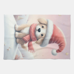 Niedlicher Weihnachtswelpen in der Weihnachtsmannm Geschirrtuch