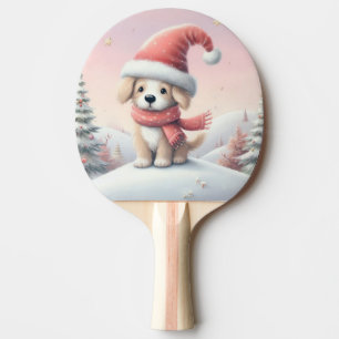 Niedlicher Weihnachtswelpen in der Weihnachtsmannm Tischtennis Schläger
