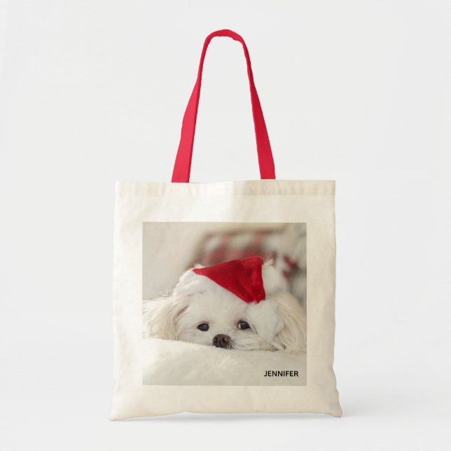 Niedlicher Weißhund in einem Red Christmas Hat Tragetasche (Vorne)