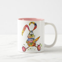 Niedlicher Whimsikfarbener Hase mit Karotte