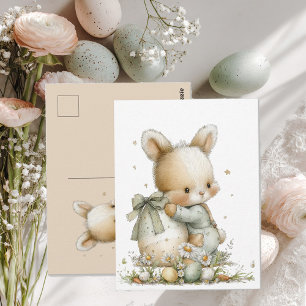 Niedliches Babykaninchen in Schlafanzug mit einem  Postkarte