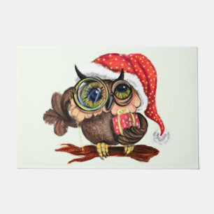Niedliches Babyschale in Weihnachtshut und Geschen Fußmatte