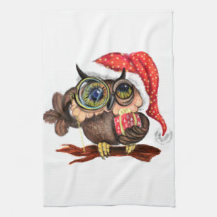Niedliches Babyschale in Weihnachtshut und Geschen Geschirrtuch