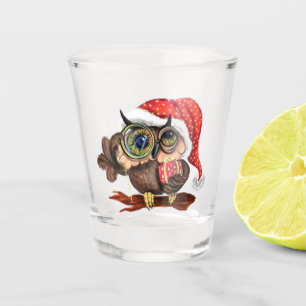 Niedliches Babyuschel in Weihnachtshut und -gesche Schnapsglas